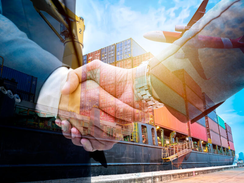 double-exposure-business-shake-hand-with-container-warehouse-background-delivery-shipment-transport-import-export-global-logistics-concept-by-boat-plane (1)