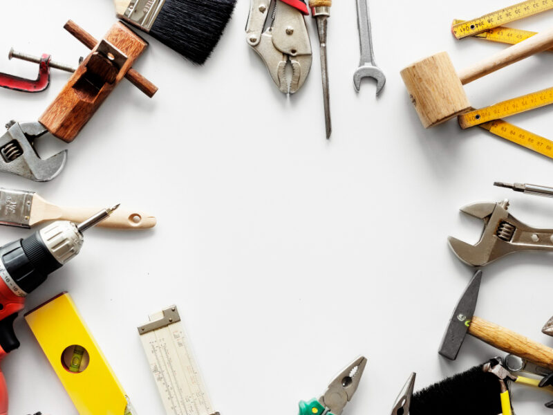 flat-lay-various-technician-tools-isolated-white-background