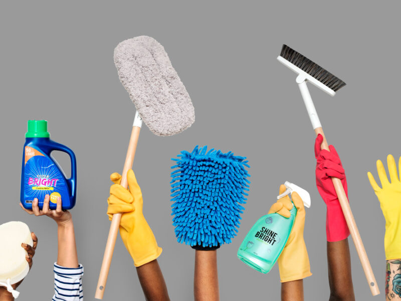 hands-holding-cleaning-tools-solutions